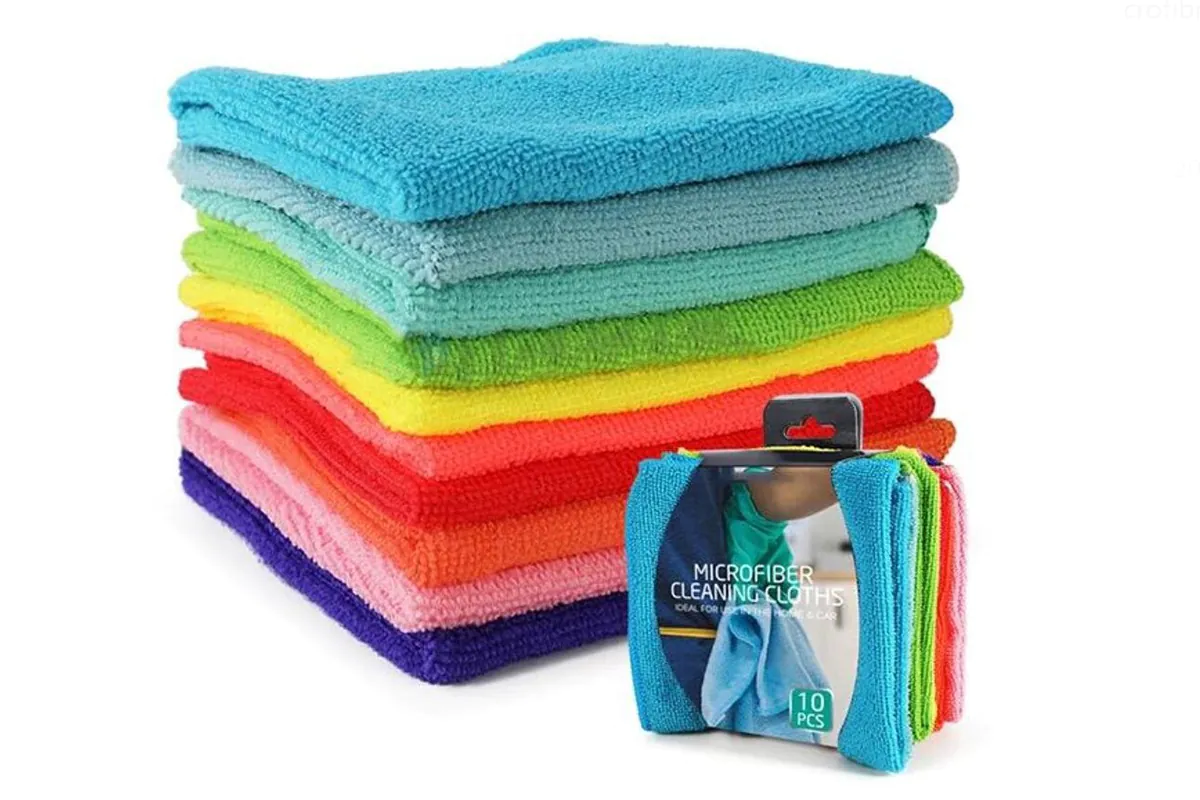 A microfiber towel being used for automotive cleaning